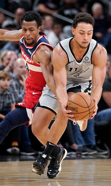 DeRozan's late shot sends Spurs to 124-122 win over Wizards